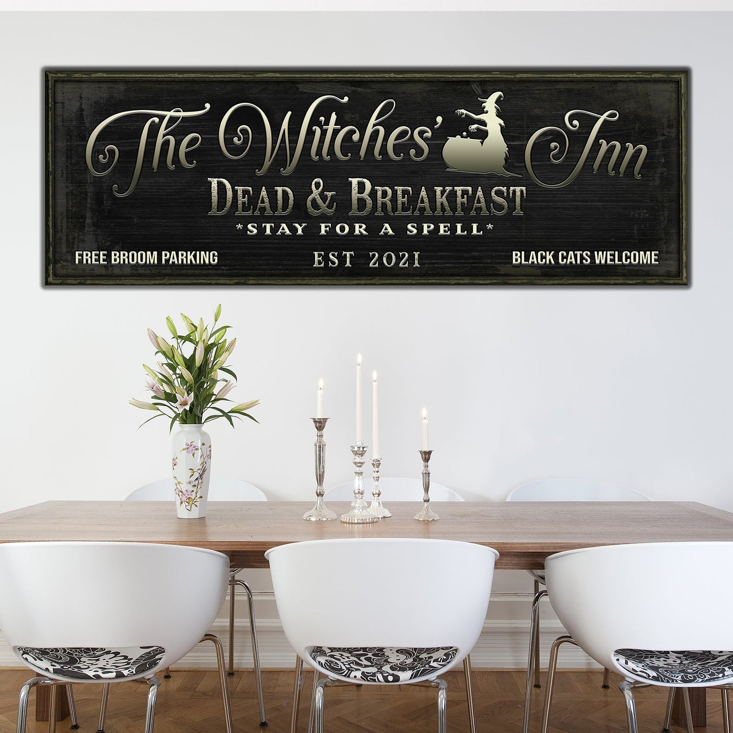 The Witches Inn Sign